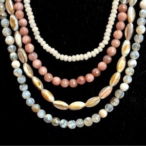Circa 1910 four strand natural stone and acrylic beaded necklace 19” branded